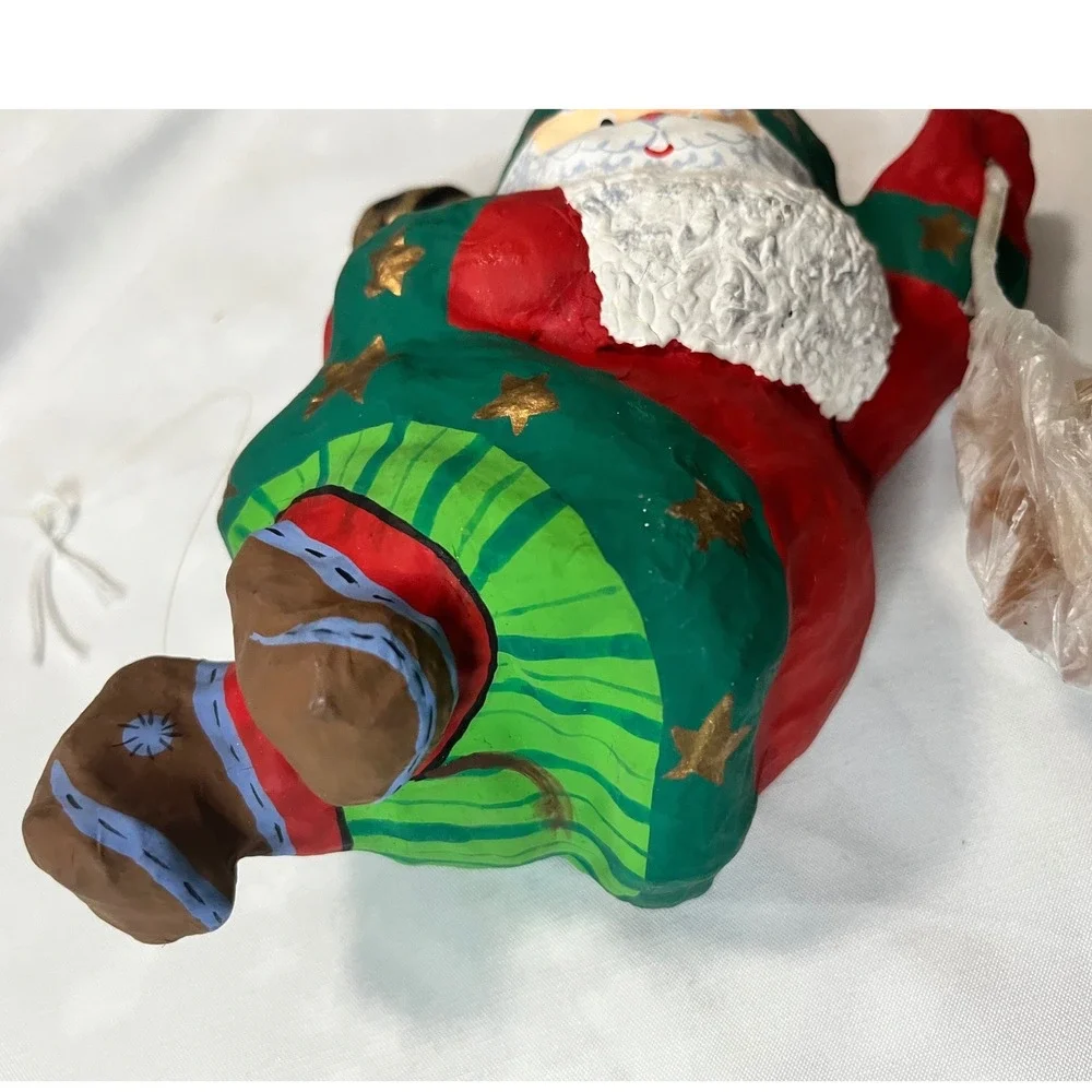 Paper mache Flying Santa with‎ gold stars